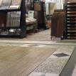 A variety of flooring in the back warehouse area.